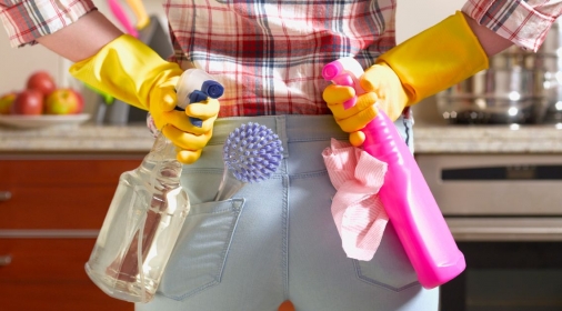 Woman with cleaning products